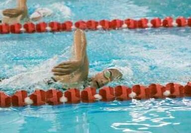 boy swims