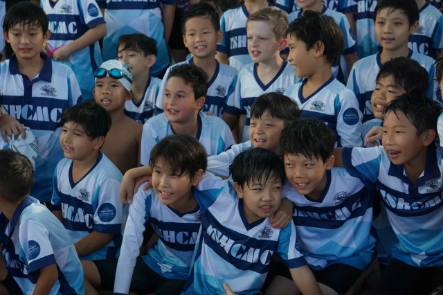 Hwan (fourth from the right in the front row) has proudly been a Stingray since his early days at ISHCMC.