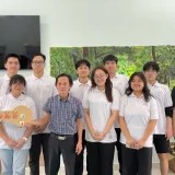 Van Anh (front row, second from the right) and the Libraries of Joy team