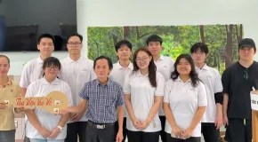 Van Anh (front row, second from the right) and the Libraries of Joy team