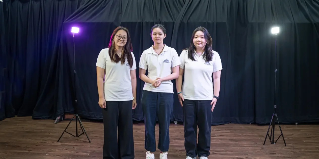 Yula (first from the right) and her friends in ISHCMC's theater technician crew