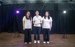 Yula (first from the right) and her friends in ISHCMC's theater technician crew