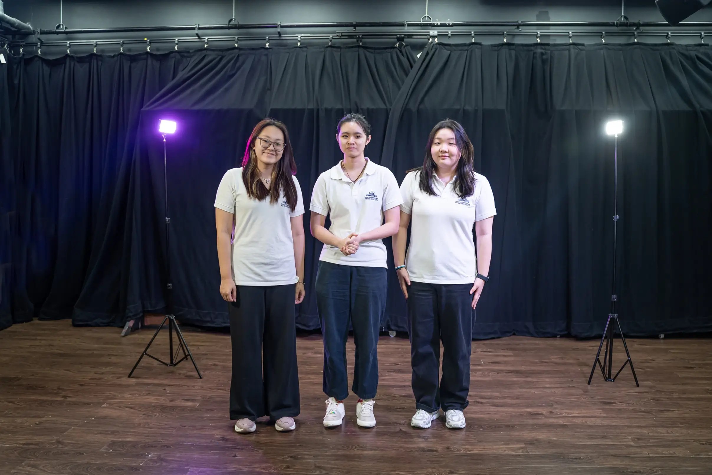 Yula (first from the right) and her friends in ISHCMC's theater technician crew