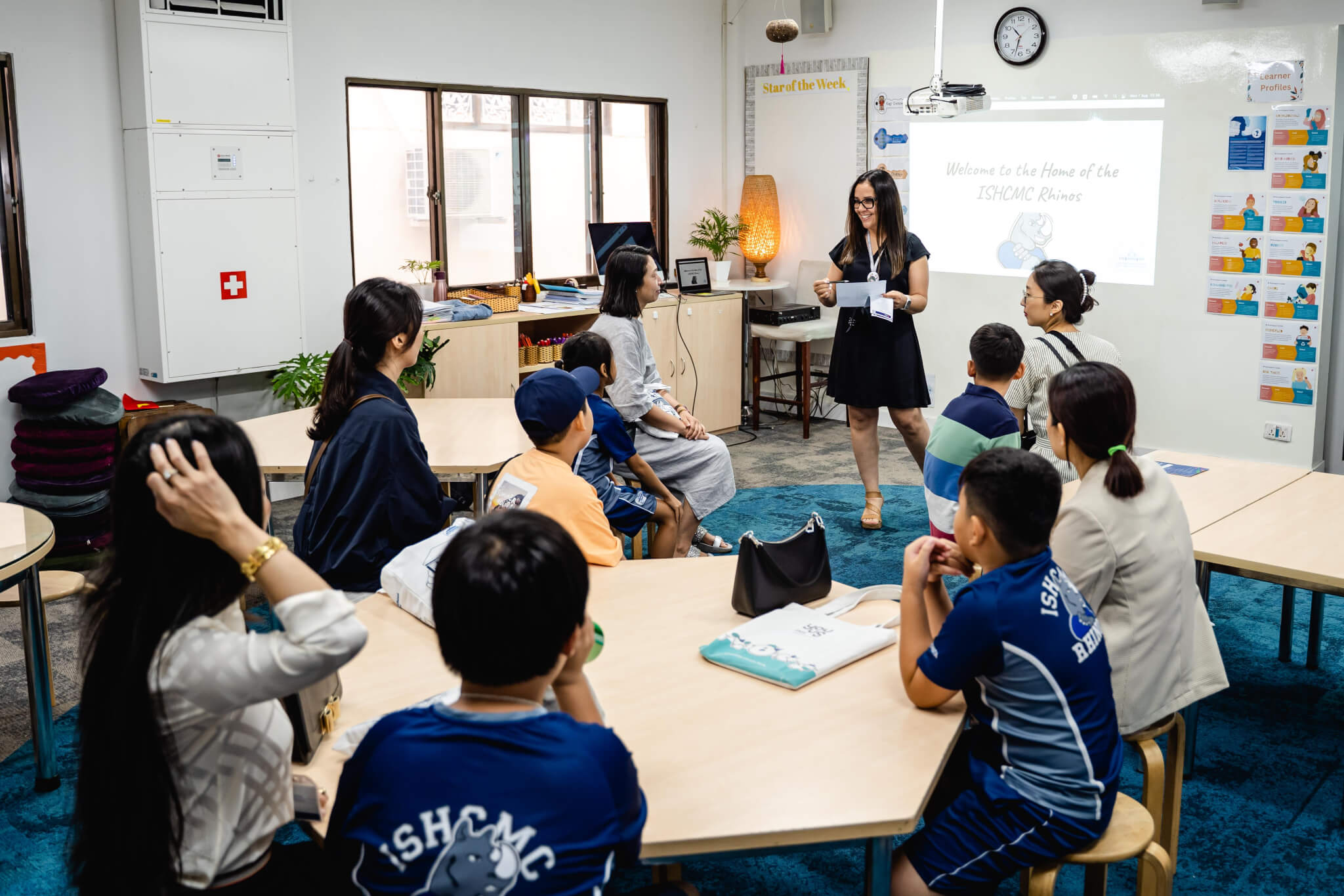 ISHCMC Open House - Parents, Students and Teacher in class